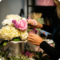 Florist arranging flowers