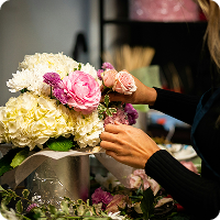 Florist arranging flowers